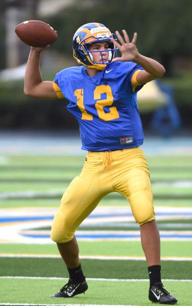 Canon-McMillan Logo - Canon-McMillan rebuilding under new coach | TribLIVE.com