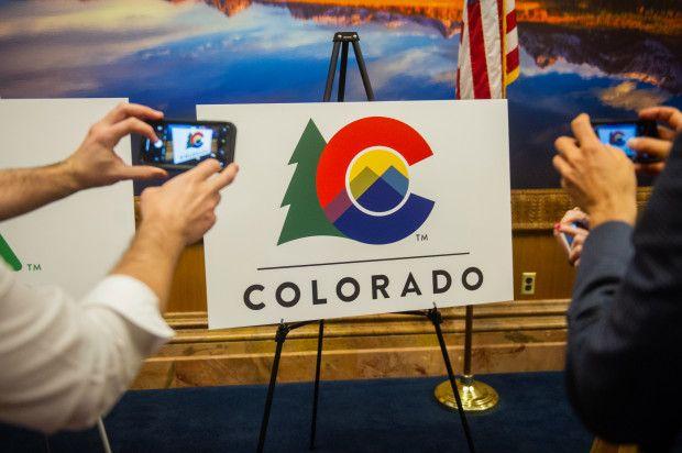 Colorad Logo - Gov. Jared Polis unveils new Colorado logo with tree, C from state