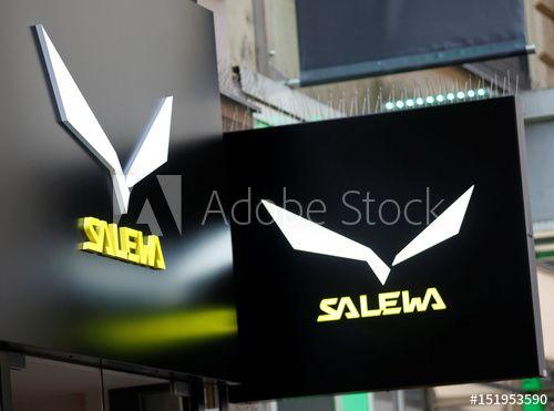 Salewa Logo - Company logos are pictured outside a Salewa store in Vienna - Buy ...