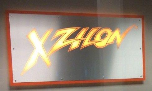 Xzilon Logo - ILLUMINATED EXCELLENCE AT XZILON - Vasin Sign Solutions