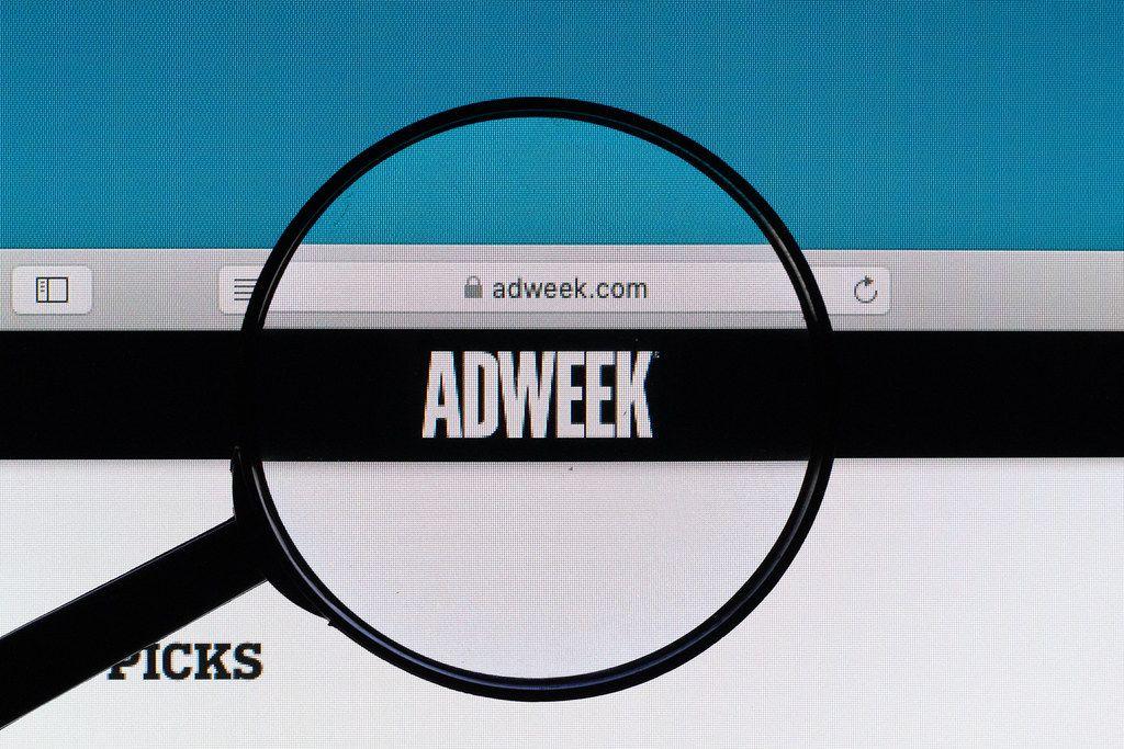 Adweek Logo - Adweek logo under magnifying glass. ✅ Marco Verch is a Prof