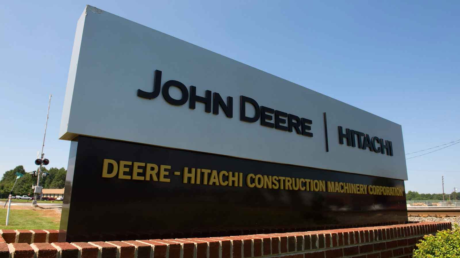 Deere-Hitachi Logo - Deere Hitachi Celebrates 30 Years Of Joint Venture