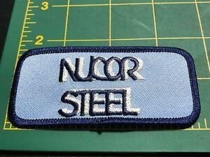 Nucor Logo - Details about Nucor Steel Production Company Vintage Logo Blue Mini Mill  Steelmaker Patch H