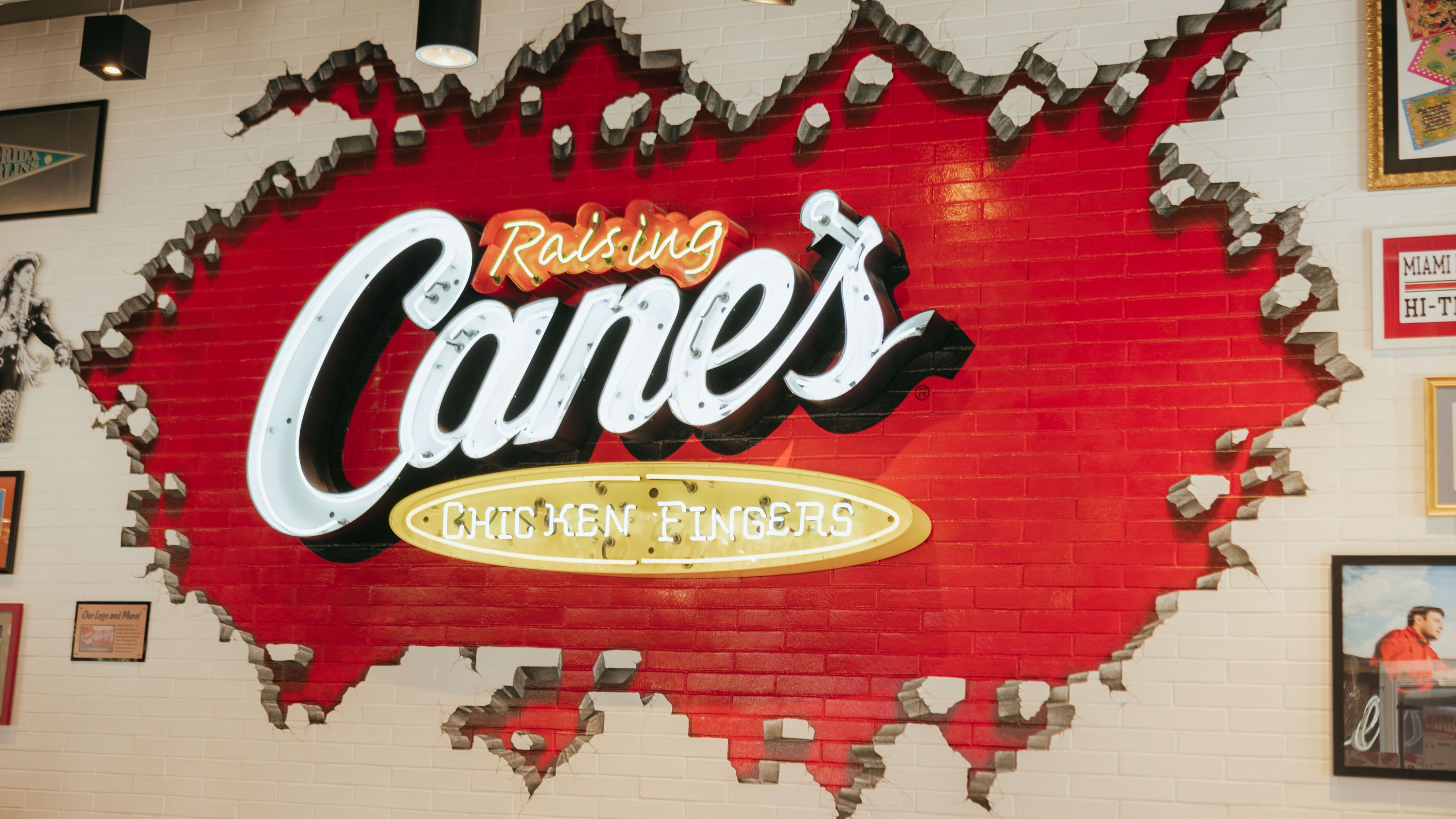 Raising Canes Logo - Raising Cane's Expands Its Restaurant Brand to an Unexpected Location -  Men's Journal