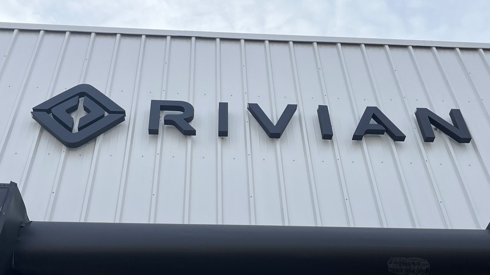 Rivian Logo - Rivian Lays Off 8% of Battery Team, Shifts Focus to Profitability, R2  Launch | PCMag