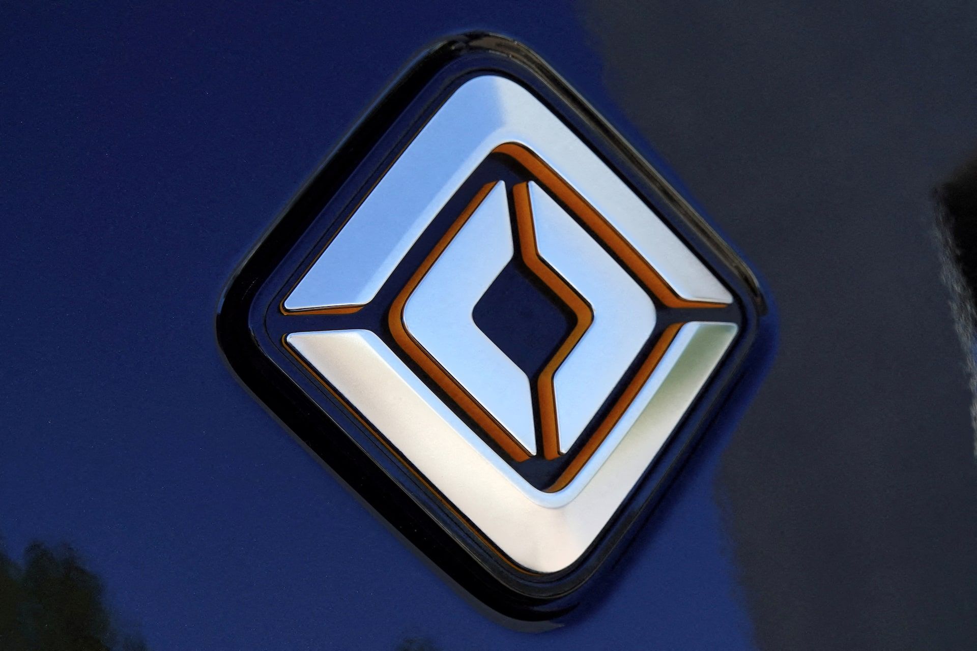 Rivian Logo - Rivian debuts custom self-driving chip, $2,500 driver-assistance package |  Reuters