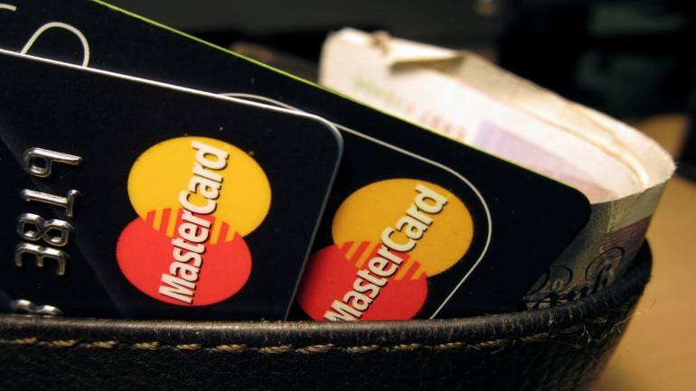 Red and Yellow Word Logo - No words: Mastercard to drop its name from logo - Moneycontrol.com