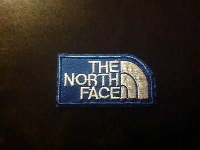 White and Blue Face Logo - 3