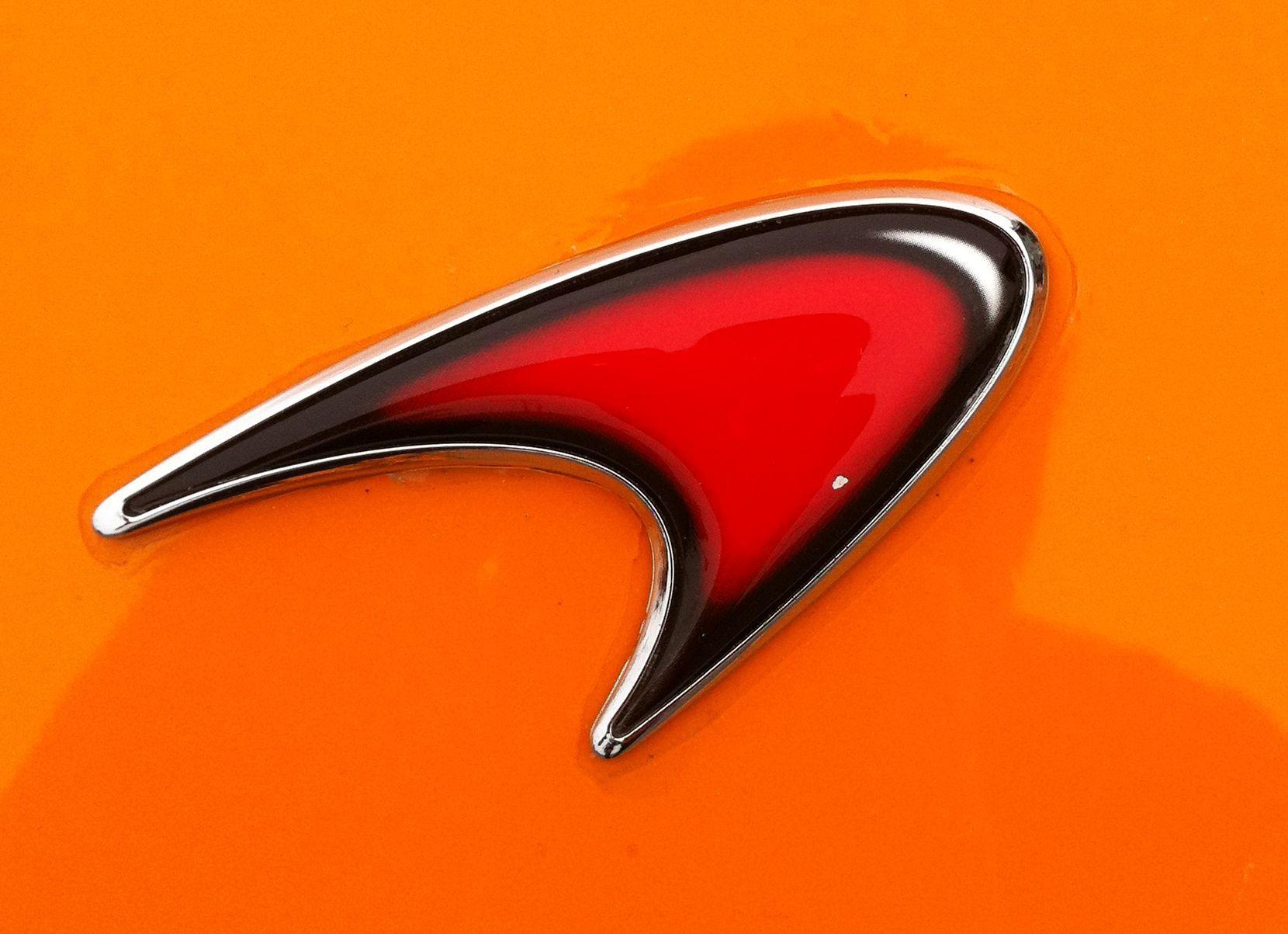Orange Car Logo - Worst Car Brand Logo Badge