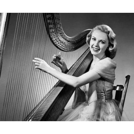 Woman Harp Logo - Young woman playing a harp and smiling Poster Print