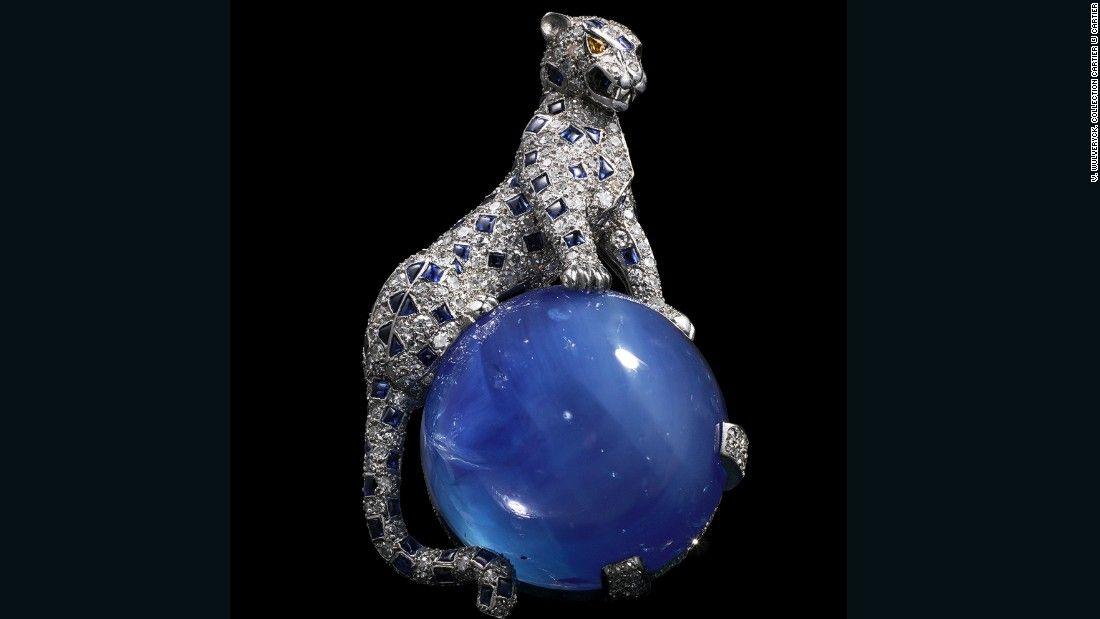 Cartier Panther Logo - The opulent allure of Cartier's bejeweled panther - CNN Style