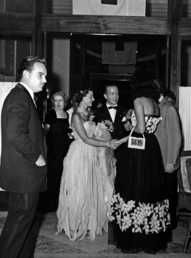 White with Red Cross Ball Logo - Past and Present of the Red Cross Ball