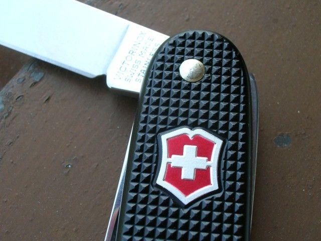 Gold Black and Red Shield Logo - red shield – Swiss knives info