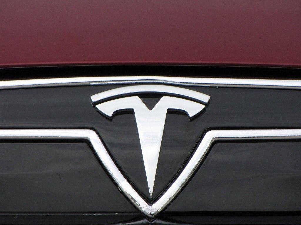 Tesla Auto Logo - What the Tesla logo means: CEO Elon Musk explains
