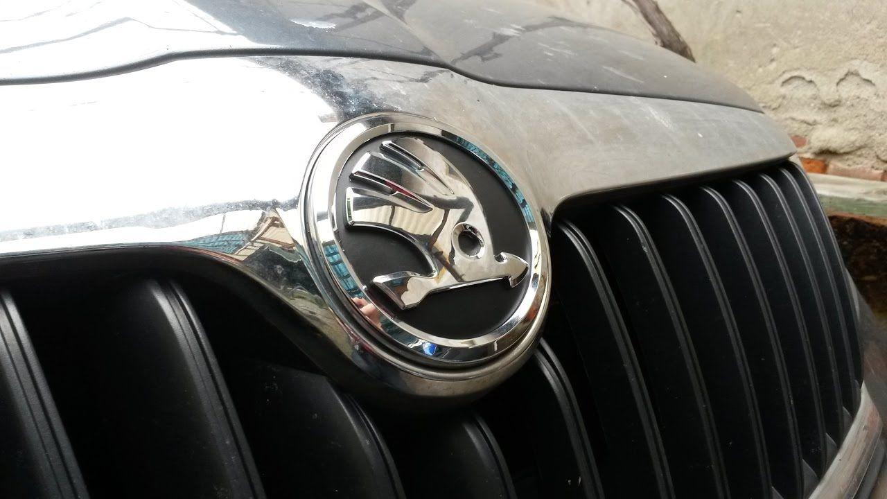 Old Skoda Logo - How to replace old green Skoda badges with the new silver ones