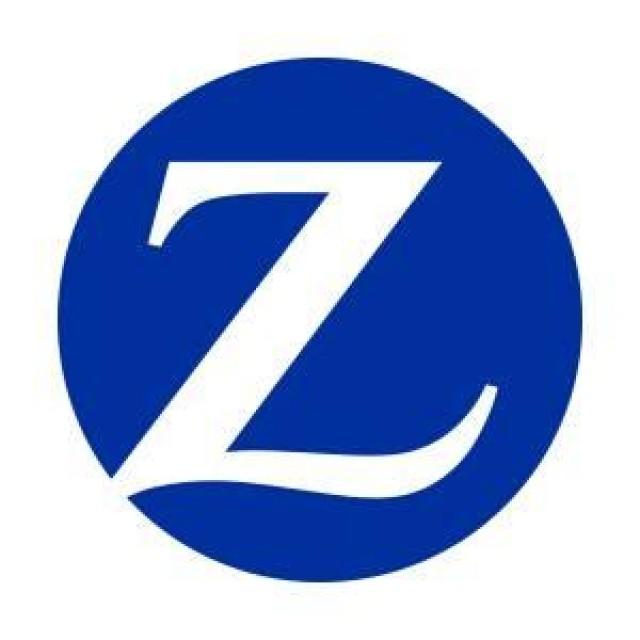 Blue Circle White Z Logo - Zurich Insurance posts 'disappointing' 53% net profit plunge. Money