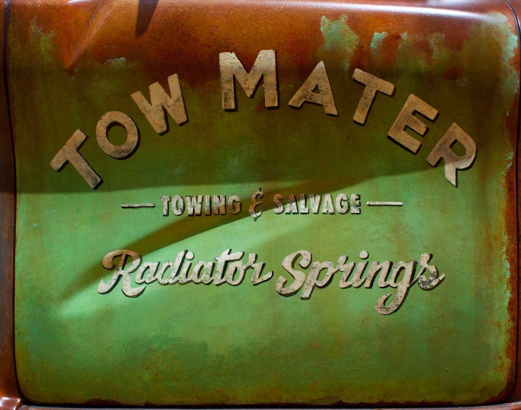 Tow Mater Logo - Tow Mater Detail. A close up of Tow Mater's door