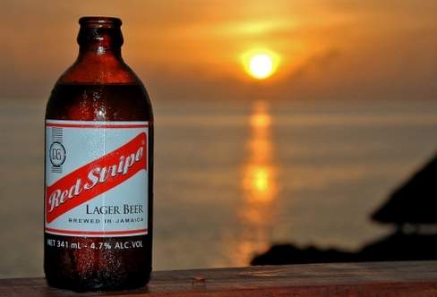 Jamaica Red Stripe Beer Logo - Imitation is sincerest form of flattery, Red Stripe says in response