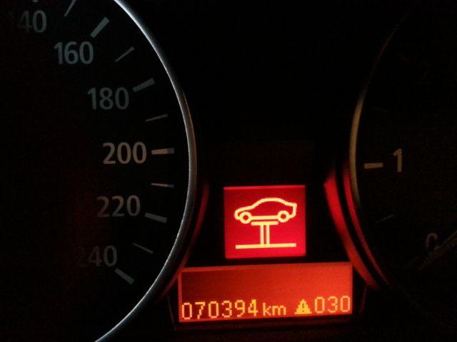 Red BMW Car Logo - What have i done!? Car on Hoist Red Symbol 118i