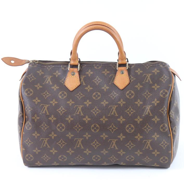 Purse LV Logo - Louis Vuitton Speedy Bag One Side Upside Down? - Lake Diary