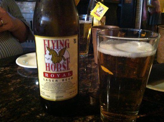 Flying Horse Beer Logo - Flying horse lager beer of Little India Restaurant & Bar