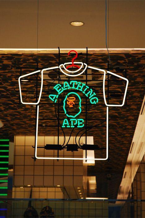 BAPE Neon Logo - MangoVine - Chic Boutiques at Aoyama - Prada, A Bathing Ape