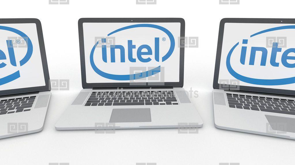 Intel Corporation Logo - Notebooks With Intel Corporation Logo On The Screen. Computer ...