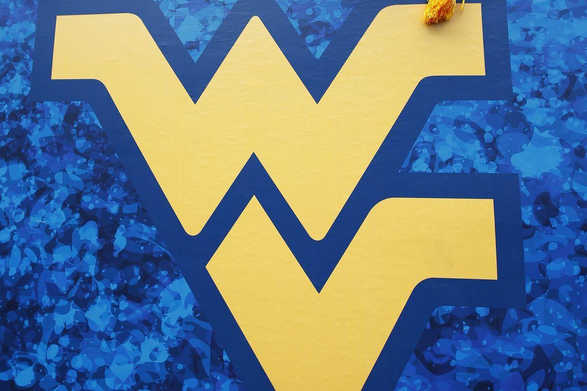 WV Football Logo - WVU football hit with hand, foot, and mouth disease before season ...