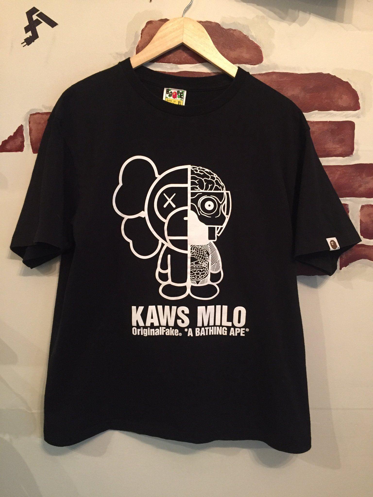 Milo X Kaws Logo - Bape Baby Milo x Kaws Tee (Large) – From Another