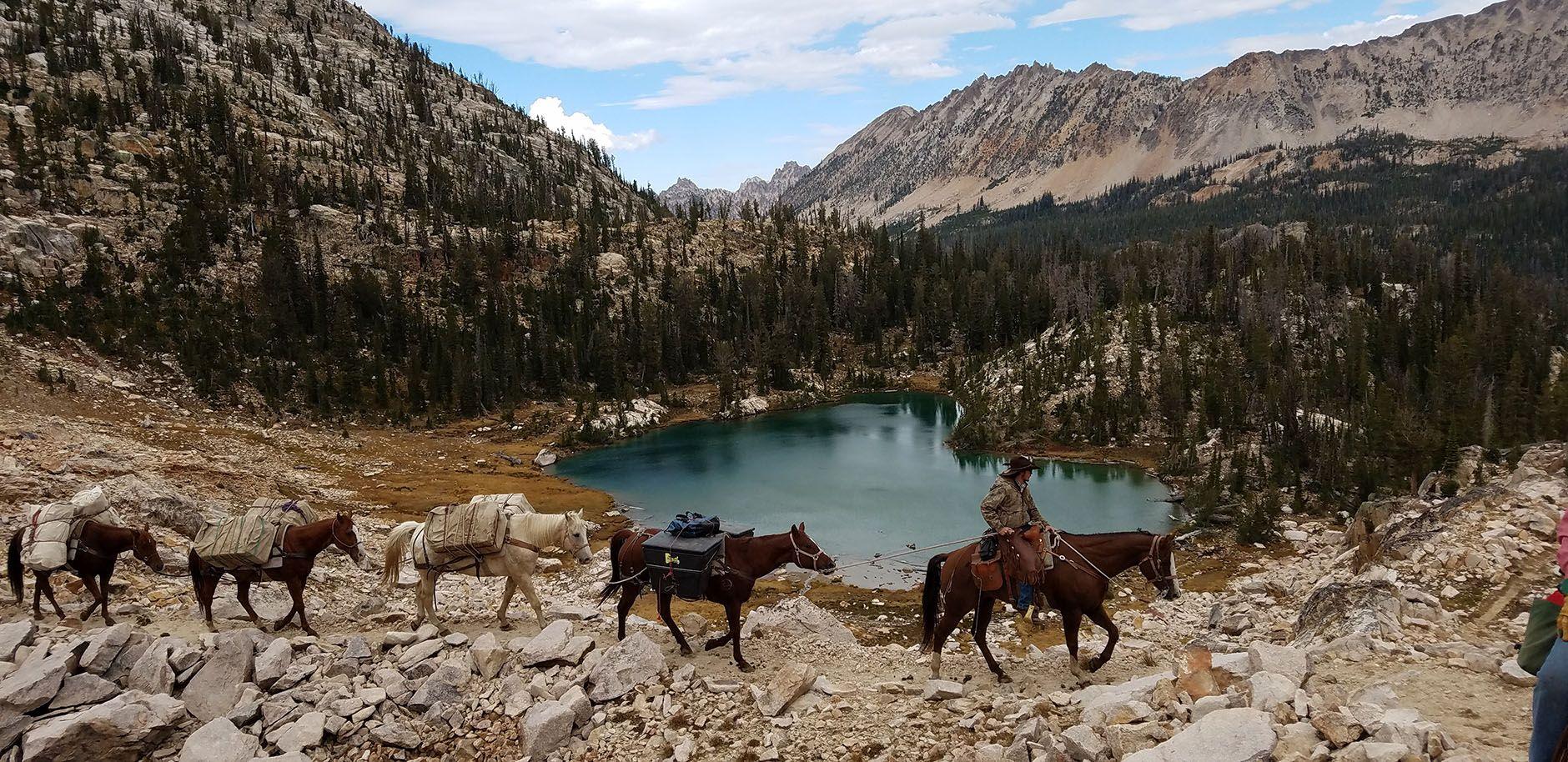 Sawtooth Mountain Logo - Idaho's Premier Outfitters / Horseback Riding / Hunting / Mystic