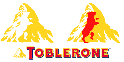 Toblerone Logo - Logo Toblerone uses the negative, white space (snow) on the ...