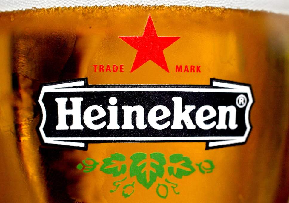 Red Orange Star Logo - Hungary threatens to ban Heineken over 'communist' red star logo