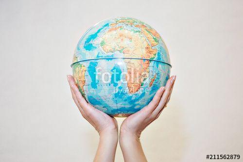Hands Holding Globe Logo - Two hands holding globe on white background. The globe is in the ...