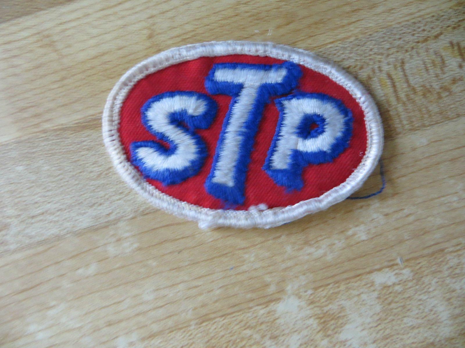 Champion Spark Plug Old Logo - STP racing sponsor Champion spark plugs auto co old stock vtg sign patch