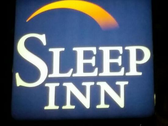 Sleep Inn Logo - The sign of the Sleep Inn at night of Sleep Inn Denver
