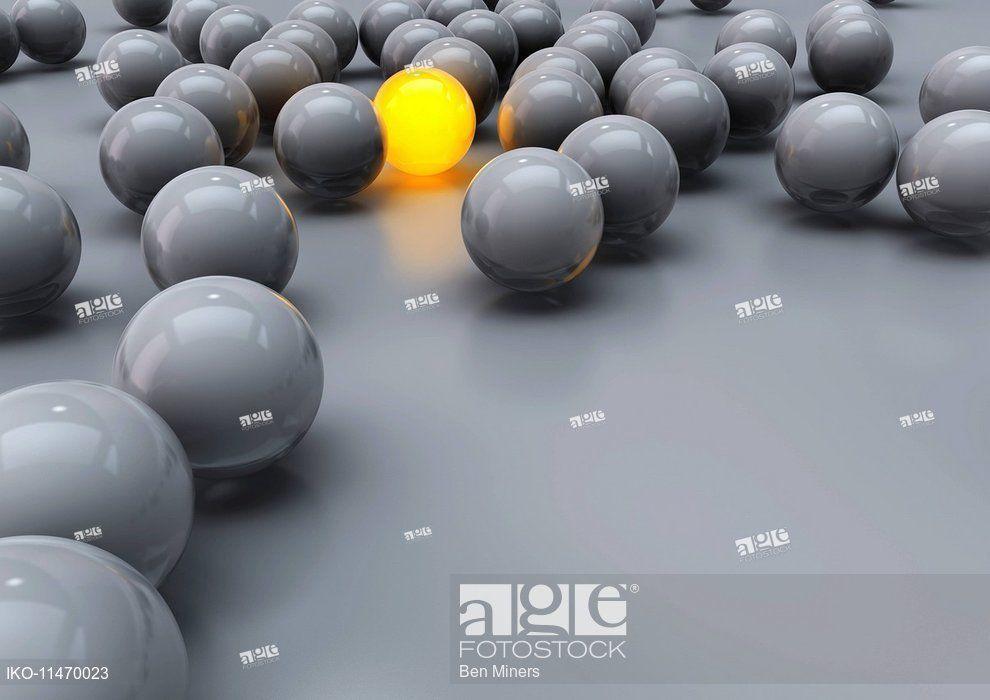 Grey Yellow Sphere Logo - Glowing yellow ball among grey balls, Stock Photo, Picture And ...