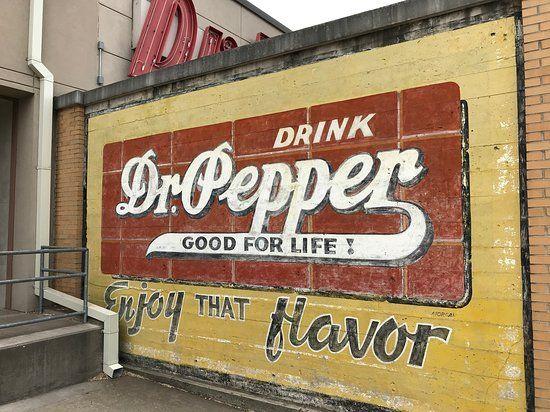 Dr Pepper Old Logo - Old sign that was moved to the courtyard of Dr Pepper
