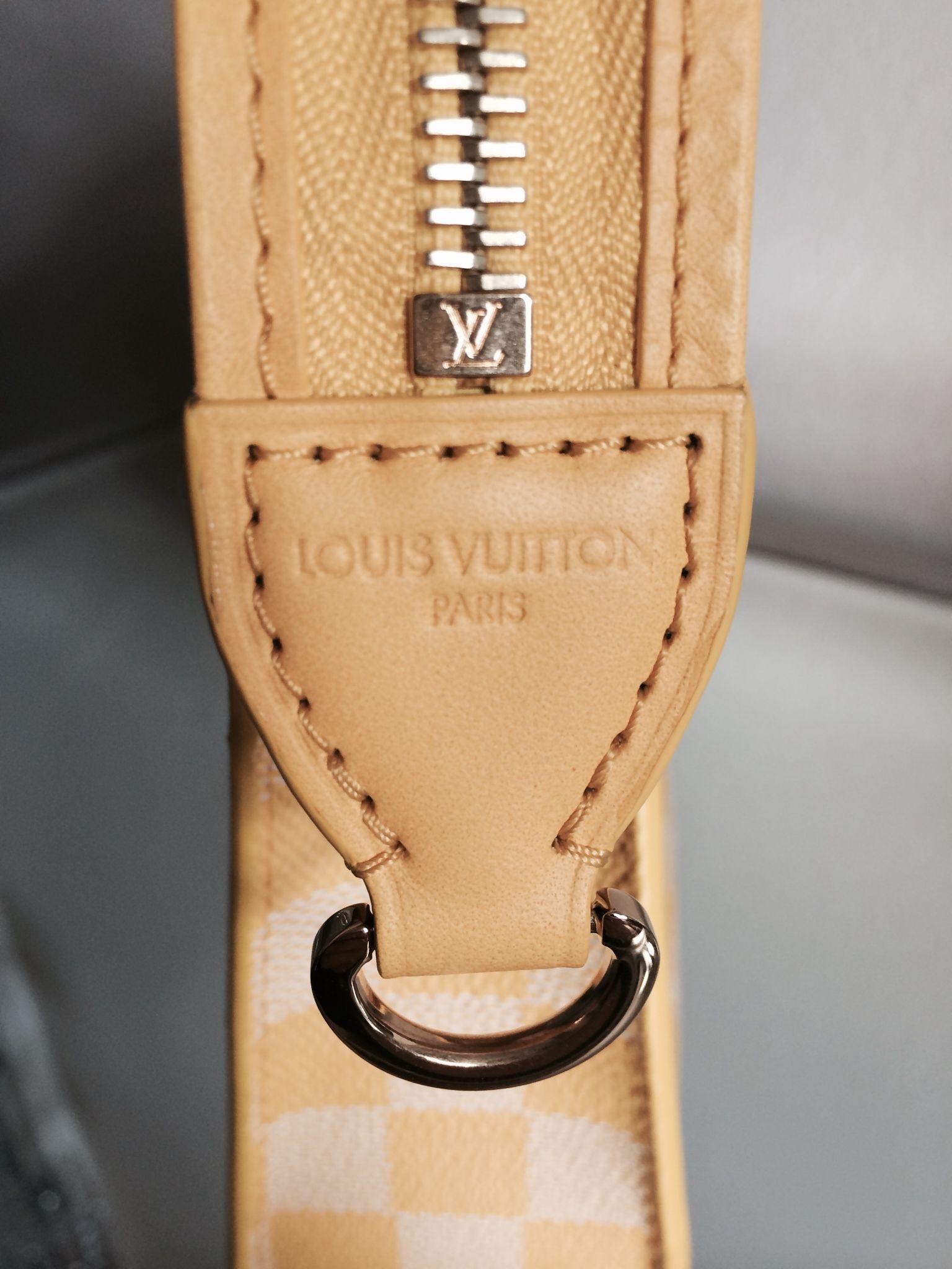 Close Up of Louis Vuitton Logo - Louis Vuitton Modul Bag Top Close Up