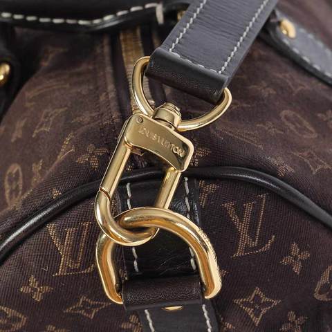 Close Up of Louis Vuitton Logo - How to authenticate a LOUIS VUITTON bag and spot a fake!