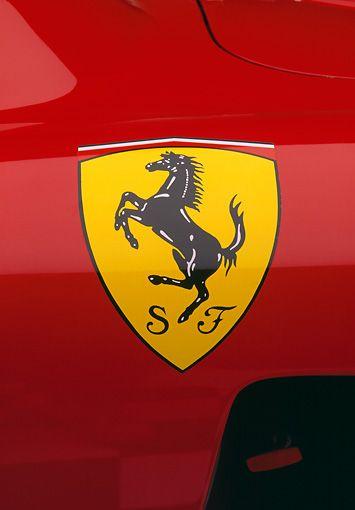 Red Ferrari Horse Logo - 1956 Ferrari 860 Monza Red Prancing Horse Emblem Detail | Kimballstock