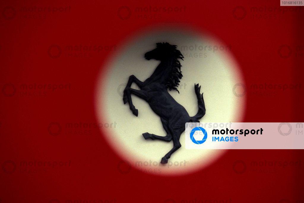 Red Ferrari Horse Logo - Photo
