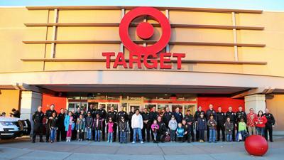 Target Department Store Logo - Police, firefighters take children on shopping spree at Farmington