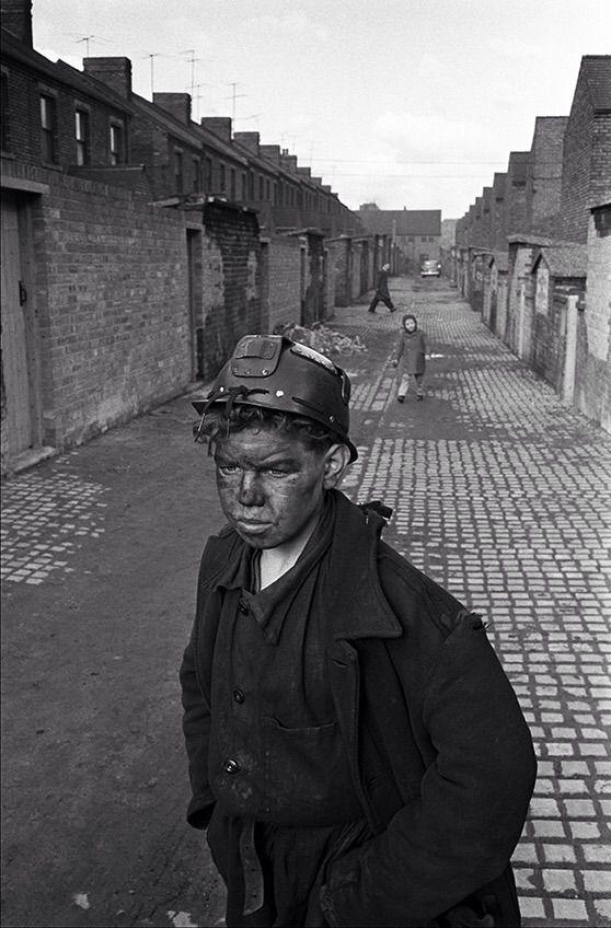 Vintage Coal Mining Logo - A young miner returns home from his shift at the Horden coal mine