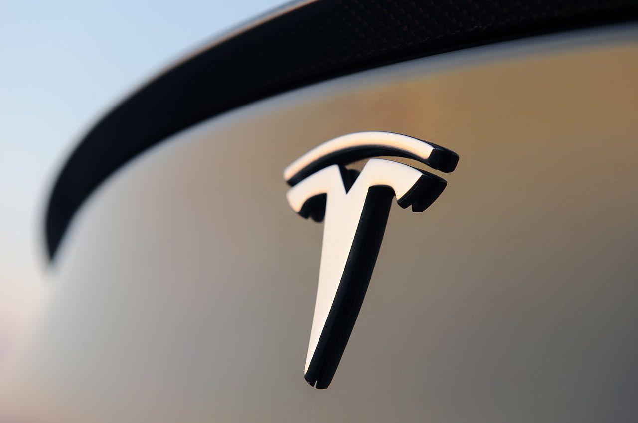 Car with T in Shield Logo - Tesla Logo, Tesla Car Symbol Meaning and History. Car Brand Names.com