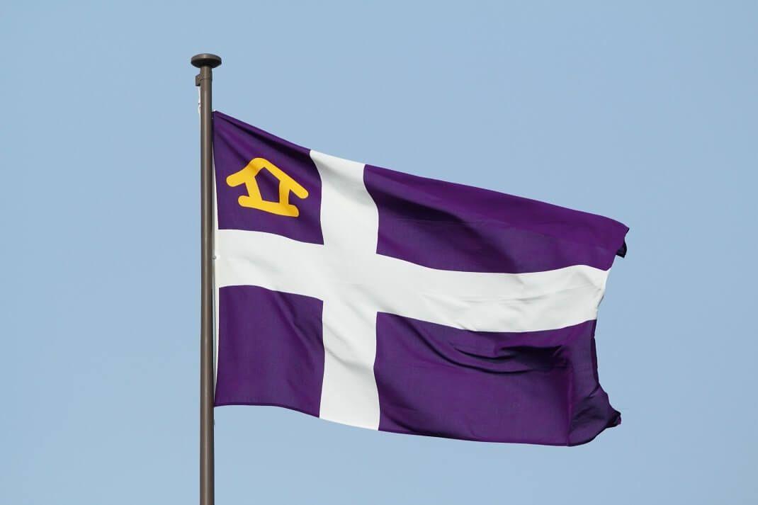 Purple White Cross Logo - Flag & Symbol