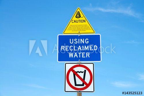 Multiple Triangle Blue Logo - Multiple caution signs at a rest stop in central california. Snake ...