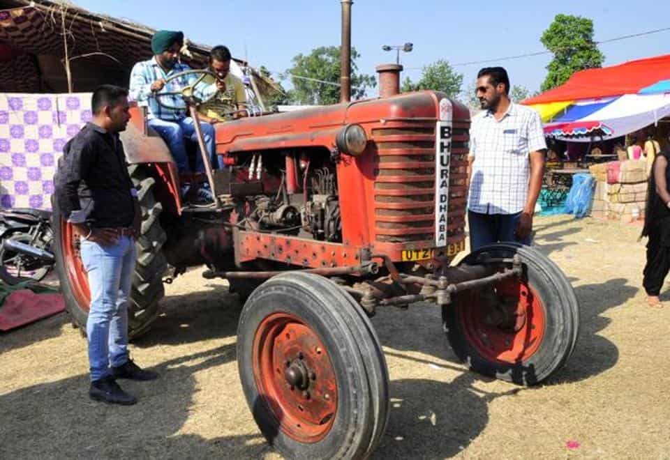 1960'S Tractor Logo - Vintage tractors: Soviet symbol of India's Green Revolution. punjab