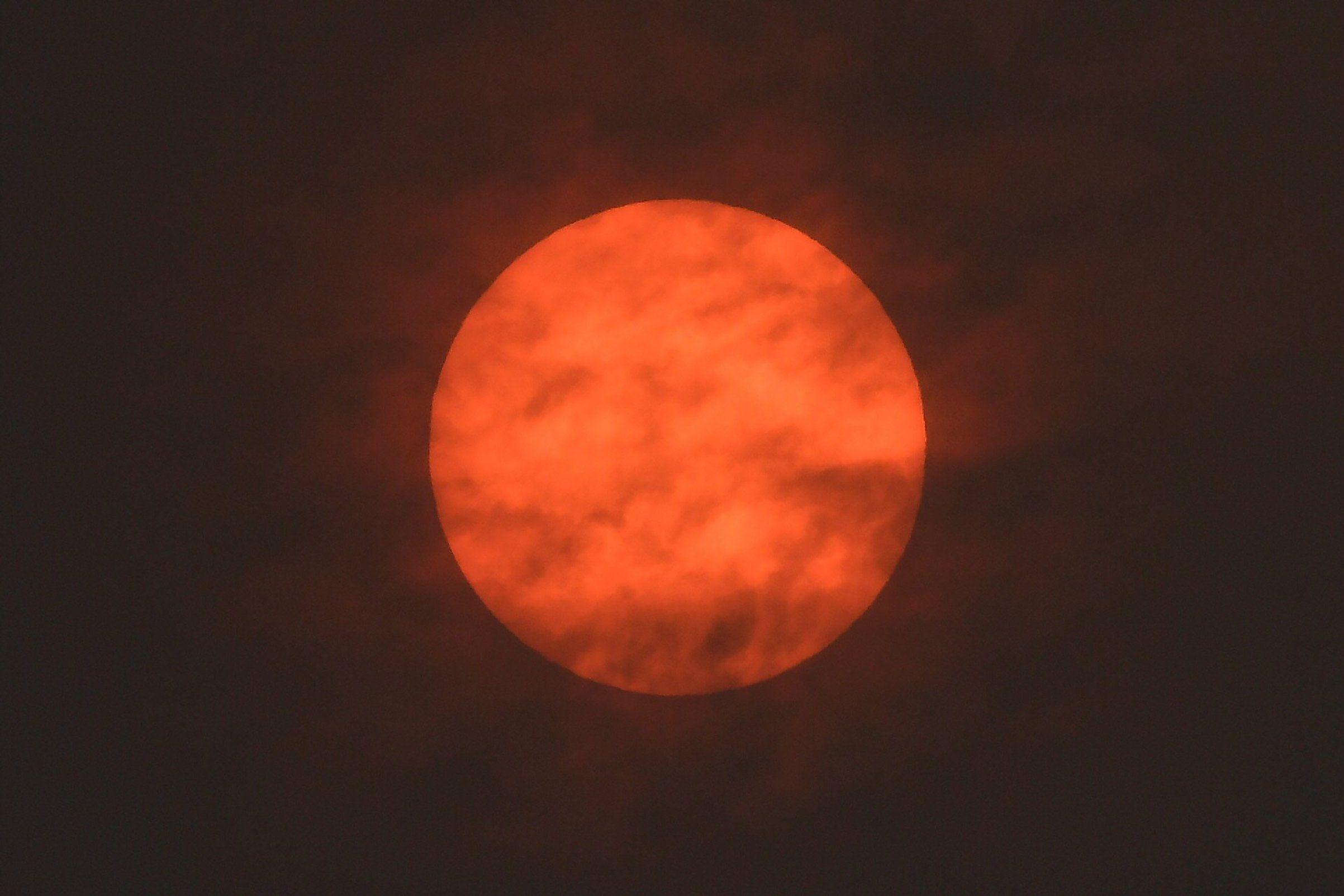 Red and Orange Sun Logo - Red Sun: Why is the Sun Red in the U.K. Right Now? | Time