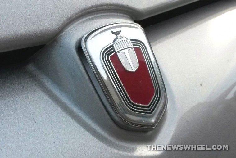 Car with Red Shield Logo - Behind the Badge: Cryptic Origins of Monte Carlo's Red Knight's ...