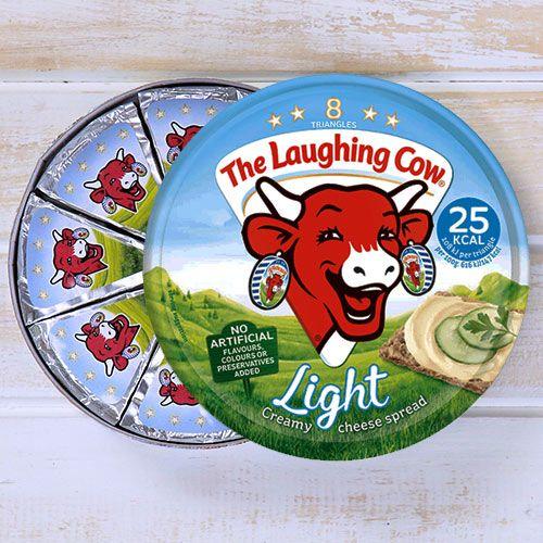 Cow Triangle Logo - The Laughing Cow Light Cheese Spread